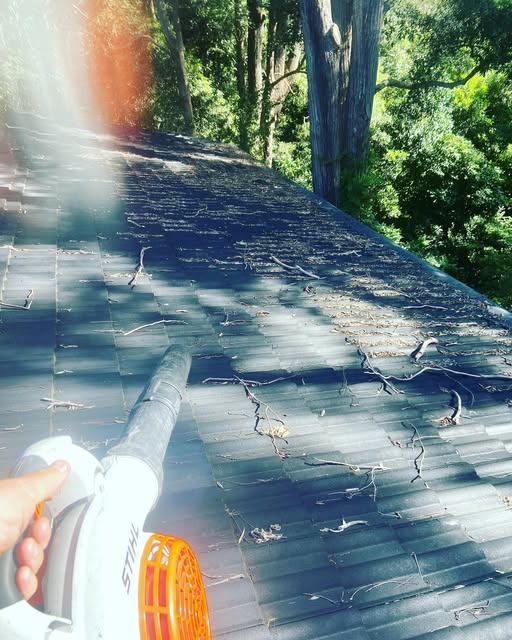 Clearing debris from a tiled roof